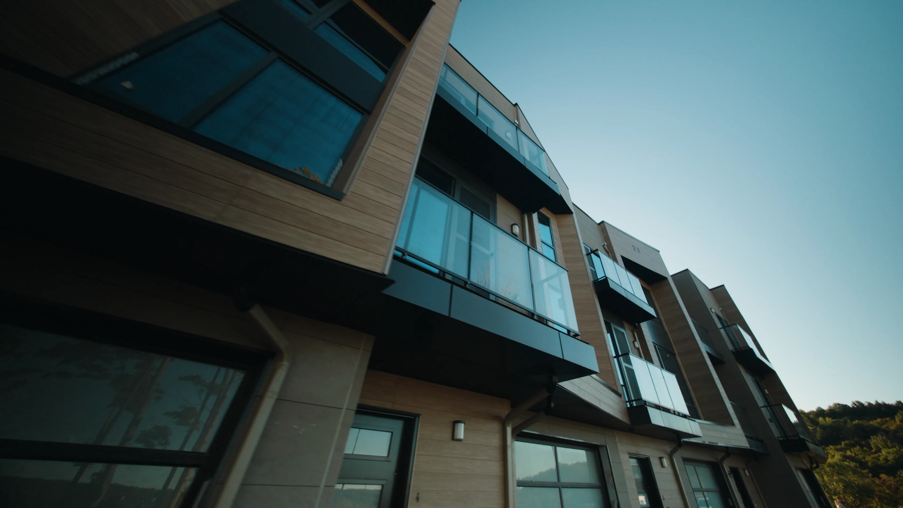 Exterior of The Summit residences with balconies.