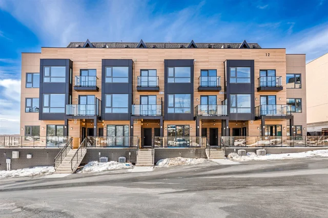 The Summit — Exterior Elevation — Photo 1